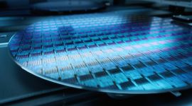 Colorful detailed view of a wafer surface for semiconductor production.